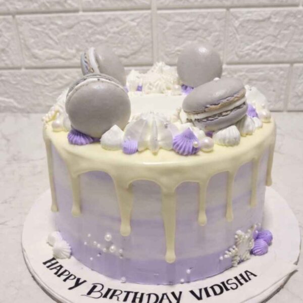 Designer macaron cake Chennai with colourful macarons and elegant finish
