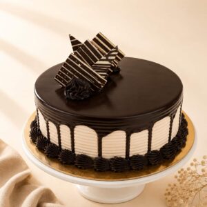 Choco Fudge Cake with moist chocolate sponge, rich fudge frosting, and smooth chocolate ganache, available for online cake delivery in Chennai from Heydudes Cake Cafe.