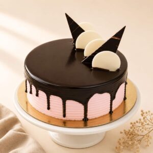 Strawberry Choco Delight Cake with soft chocolate sponge, fresh strawberry cream, and premium chocolate decoration, available for online cake delivery in Chennai from Heydudes Cake Cafe.